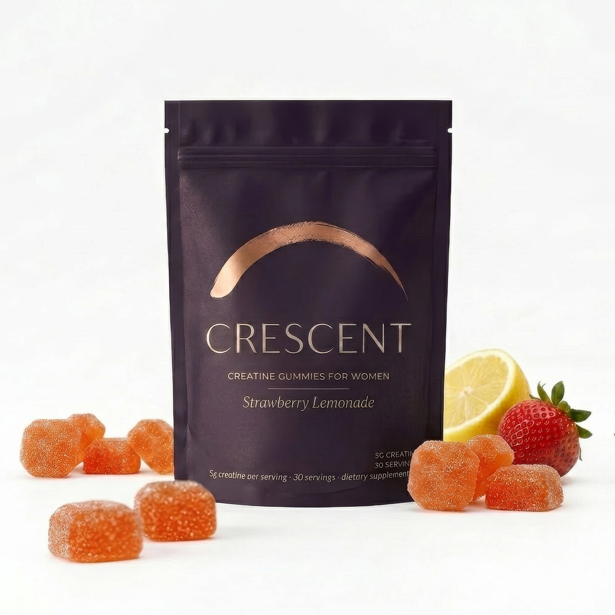 Strawberry Lemonade creatine gummies pouch with fresh strawberries and lemon